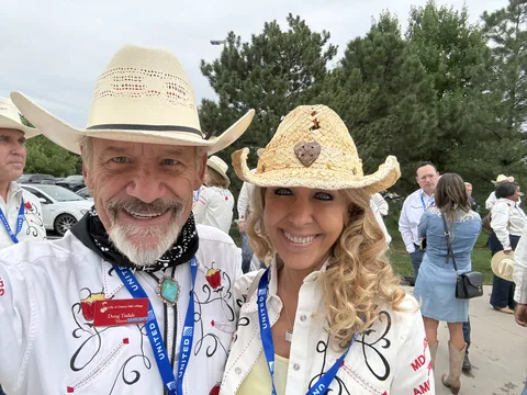 Doug Tisdale with community supporters at an outdoor event